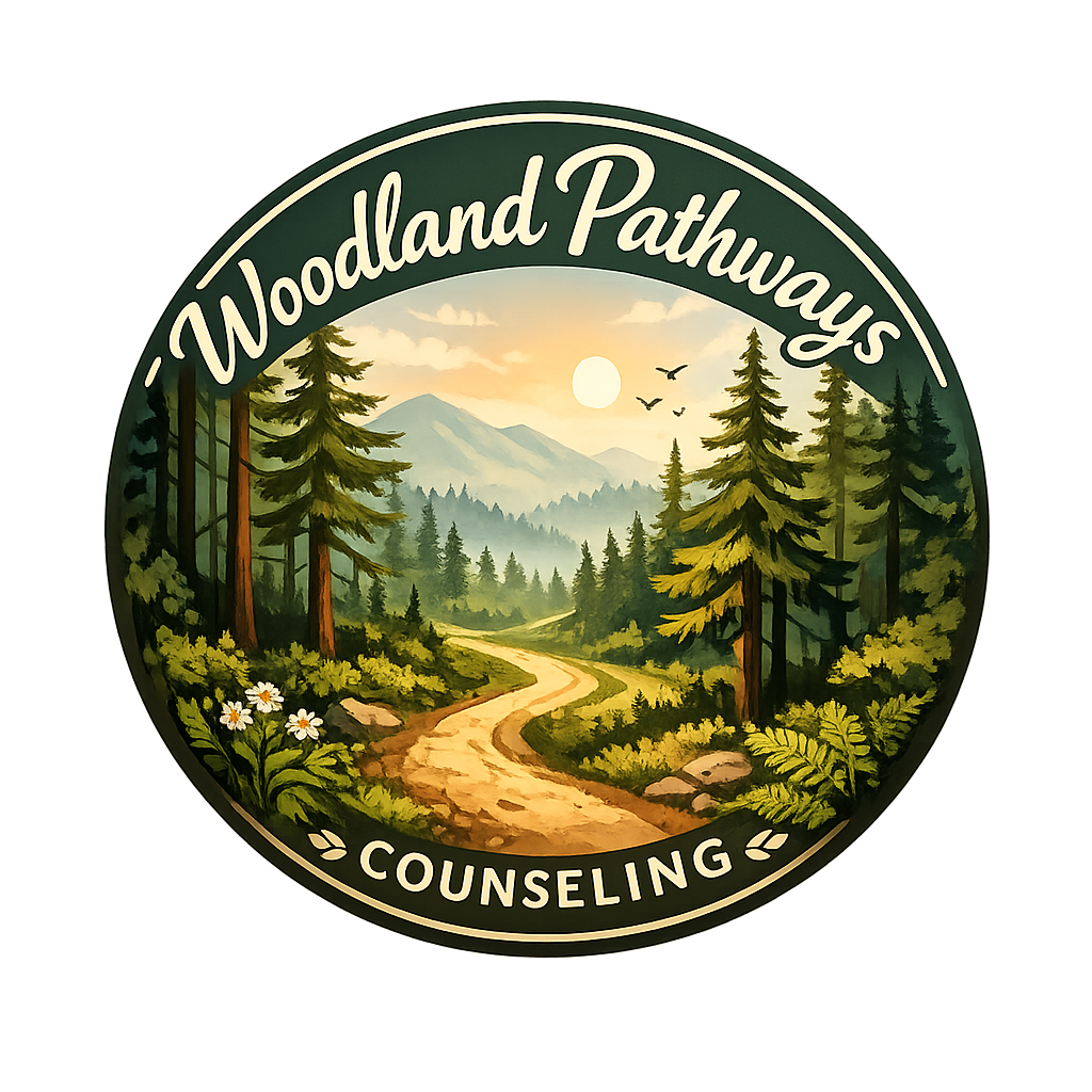 Logo for Woodland Pathways Counseling, featuring a winding dirt path through a lush forest with mountains and a sunset in the background.
